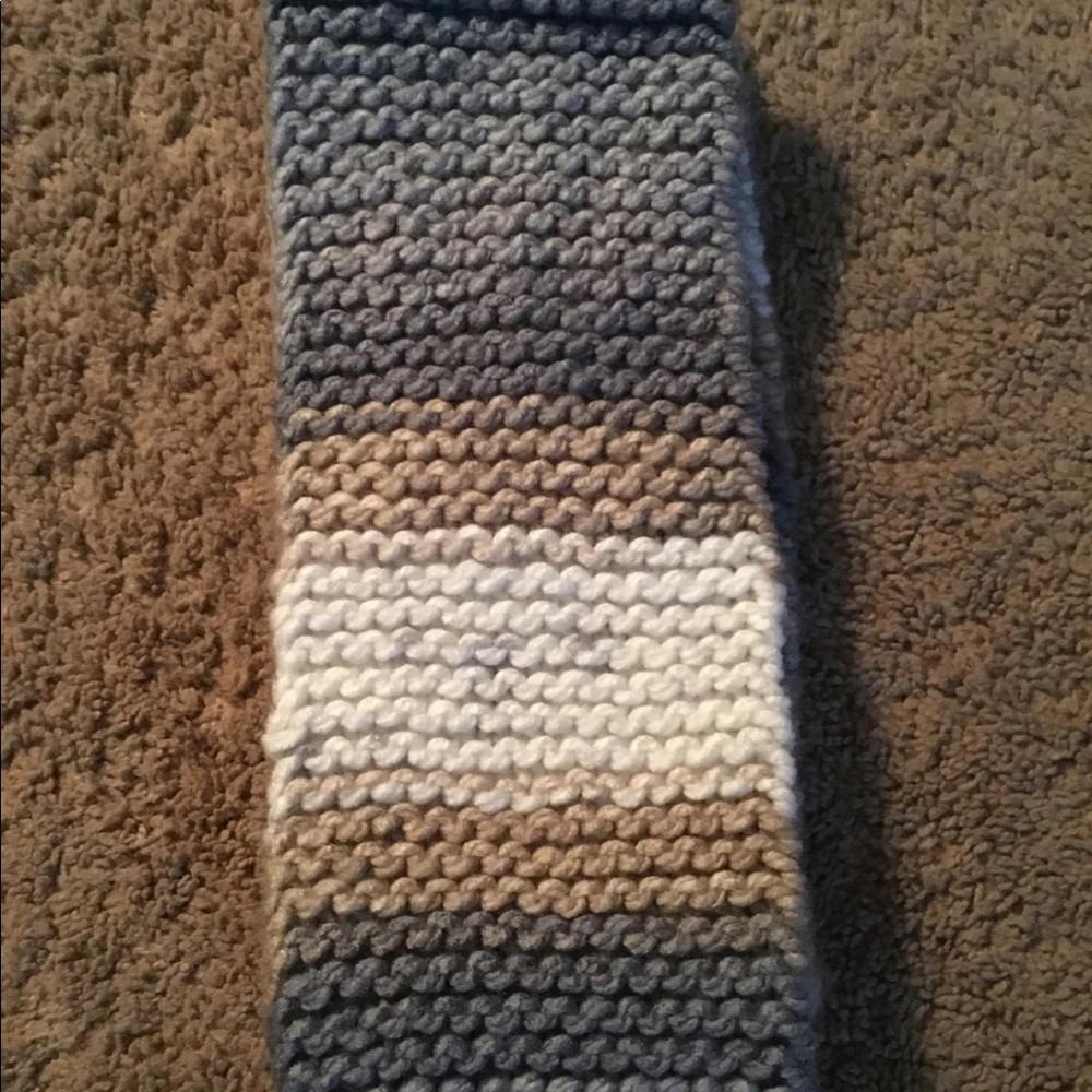 Homemade Tricoloured knitted scarf.